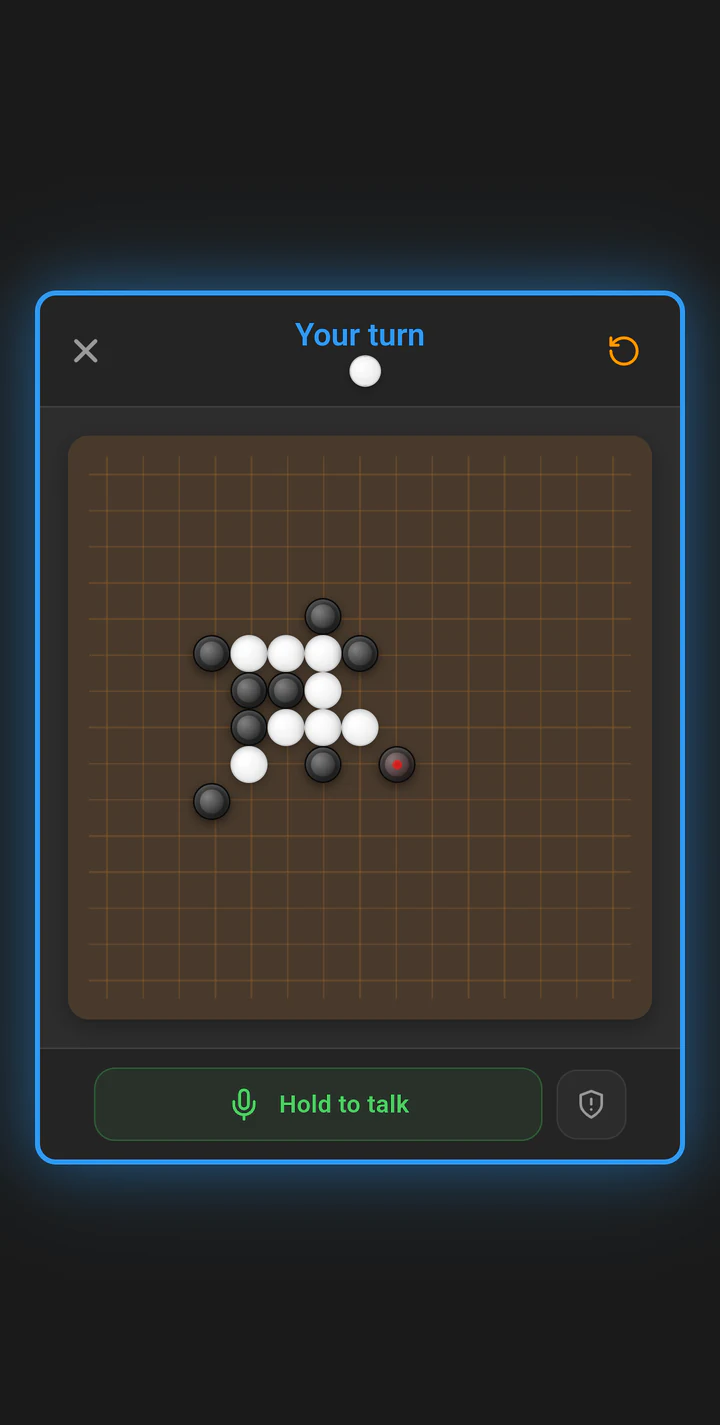 A Gomoku board on Play Lounge with black and white stones placed across the grid